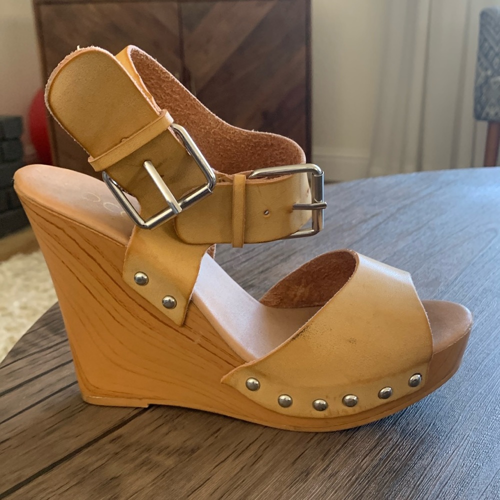 Neutral 4” wedge heels.  Size 6. Good condition